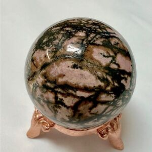 Rhodonite crystal ball with Stand